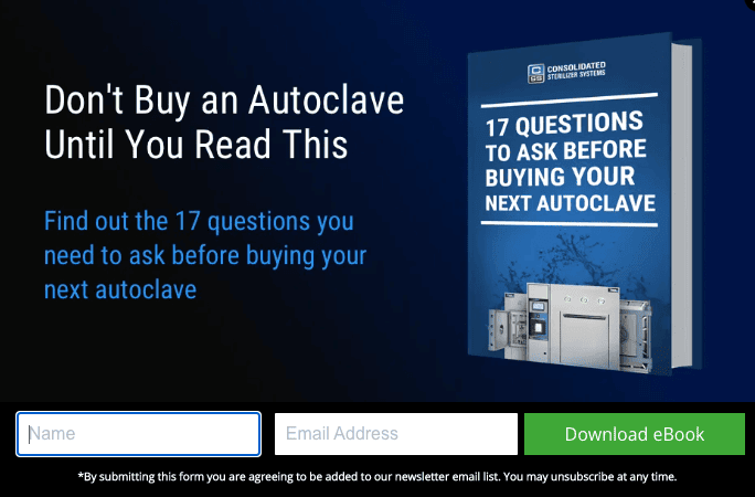 A photo of a book on a dark background. The book is titled “17 Questions to Ask Before Buying Your Next Autoclave.” There is a form with the fields “Name” and “Email Address,” and a green call-to-action button that reads “Download eBook.”