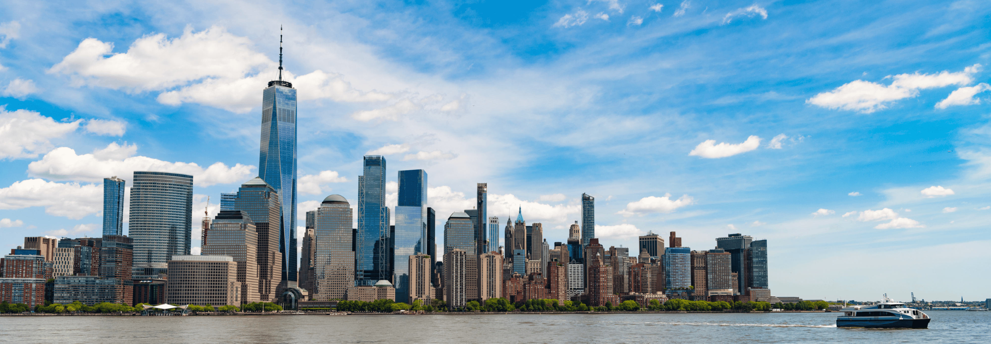 Higher Ed | Paid Search Landing Page Strategy 2 Lower Manhattan skyline with One World Trade Center and other skyscrapers along the Hudson River.